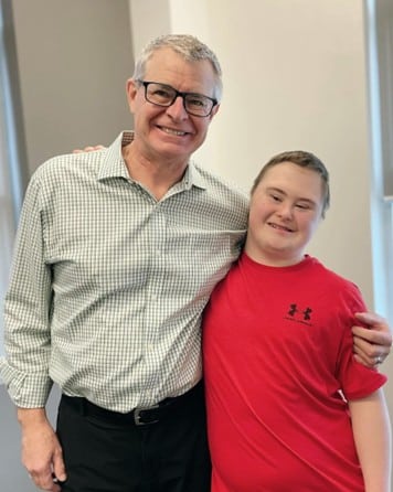 Dr. Bruce Hill with one of his patients