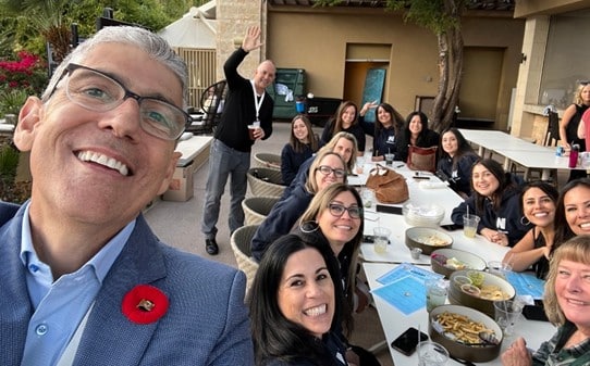 Dr. Paul Helpard takes a selfie with a Corus practice team.